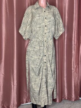 Button-Front Cream and Black Patterned Dress